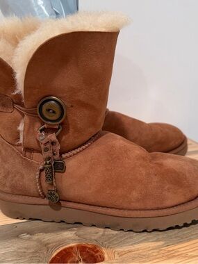 UGG Chestnut Suede Boot with Brass Charm Accents